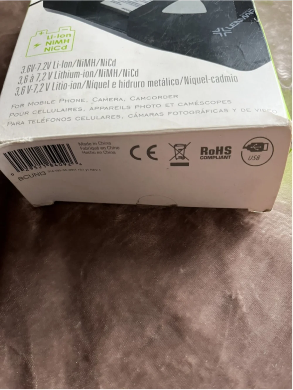 RARE FINE All-in-one battery charger for Mobile Phones, Cameras, and Camcorders